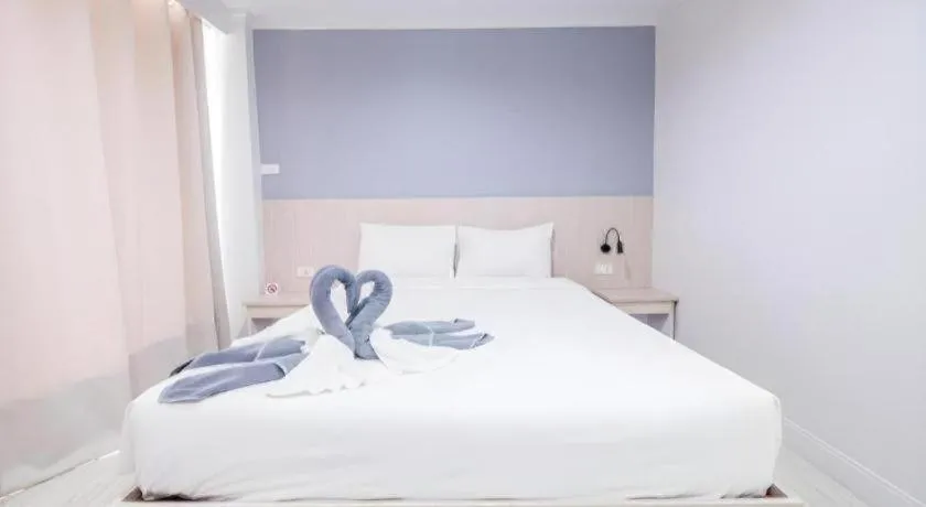 Bed in Grand PL Hotel