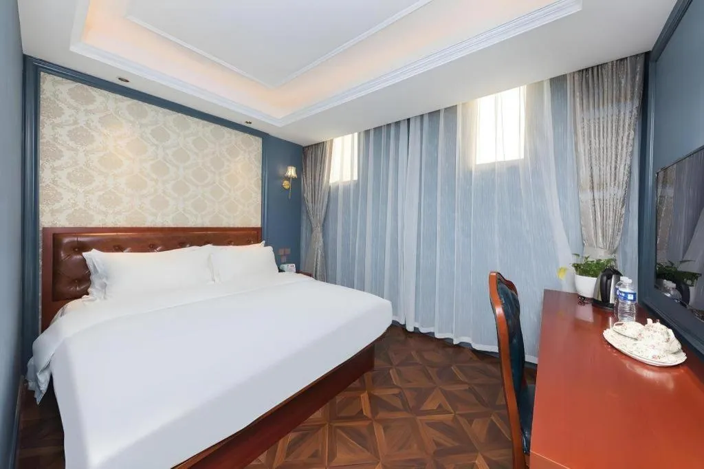 Bed in Yitingzhenshe Hotel Beijing Qianmen