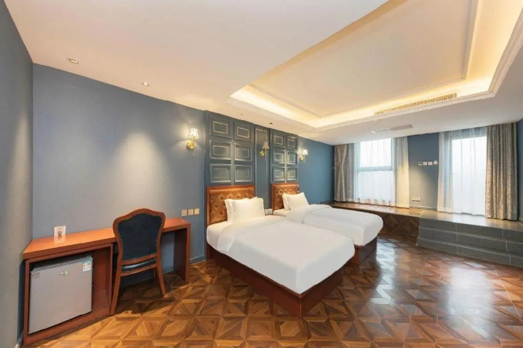 Bed in Yitingzhenshe Hotel Beijing Qianmen