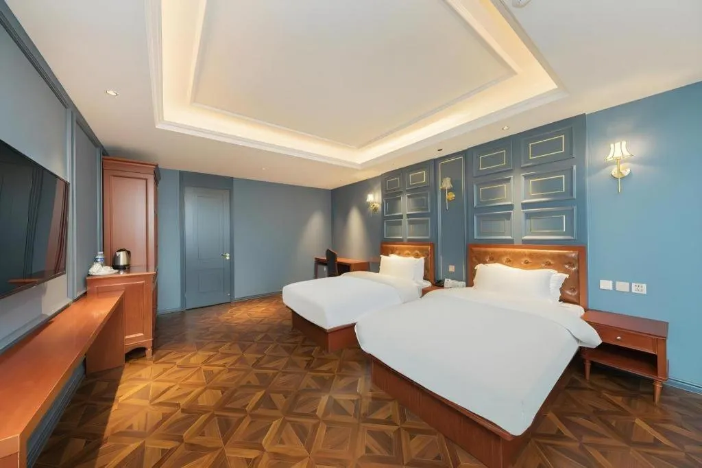 Bed in Yitingzhenshe Hotel Beijing Qianmen