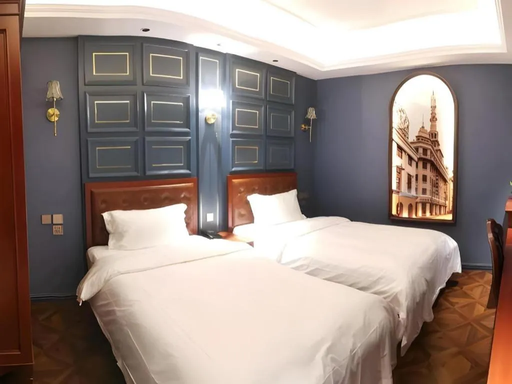 Bed in Yitingzhenshe Hotel Beijing Qianmen