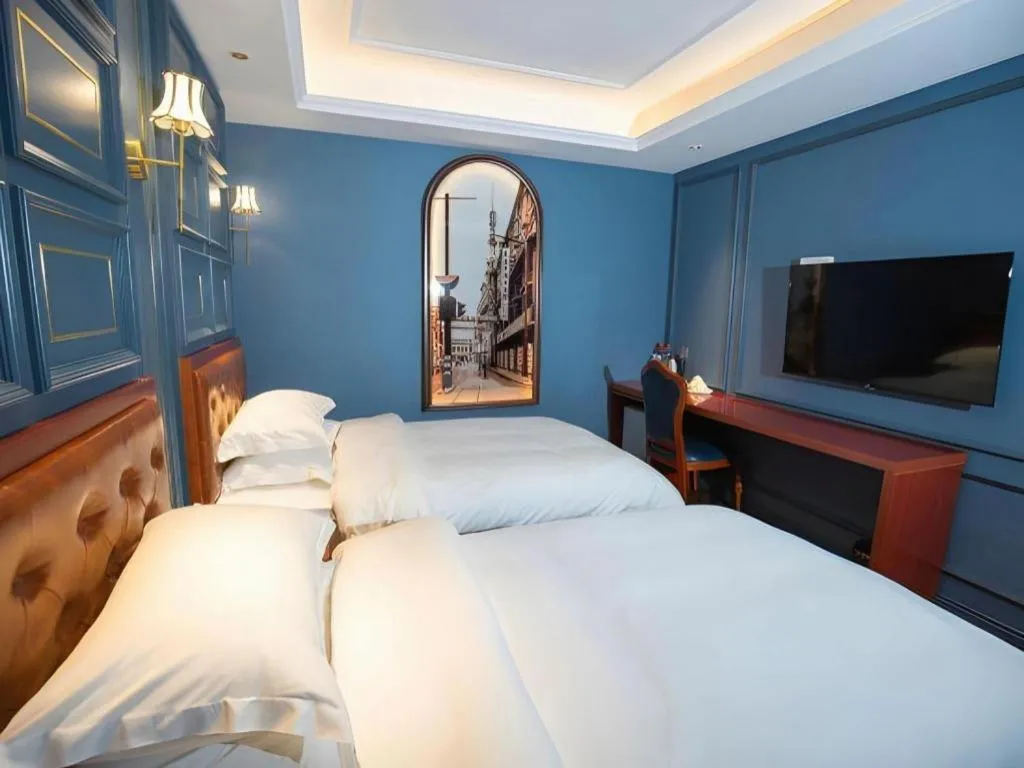 Bed in Yitingzhenshe Hotel Beijing Qianmen