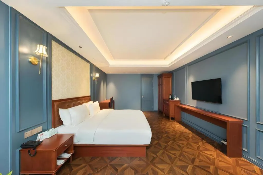 Bed in Yitingzhenshe Hotel Beijing Qianmen