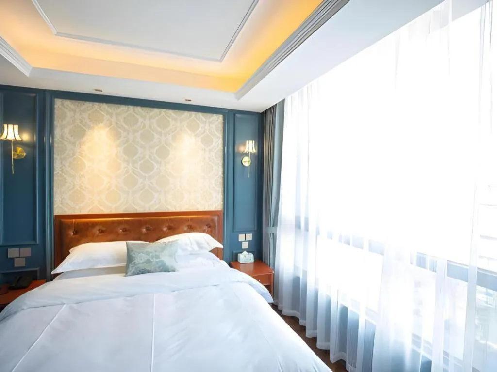 Bed in Yitingzhenshe Hotel Beijing Qianmen