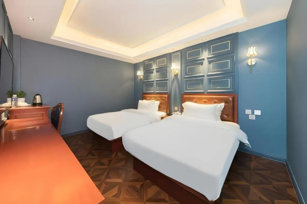 Bed in Yitingzhenshe Hotel Beijing Qianmen