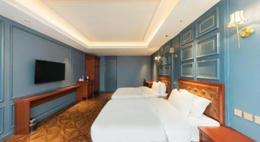 Bed in Yitingzhenshe Hotel Beijing Qianmen