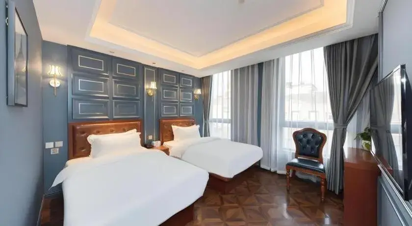 Bed in Yitingzhenshe Hotel Beijing Qianmen Bed in Yitingzhenshe Hotel Beijing Qianmen