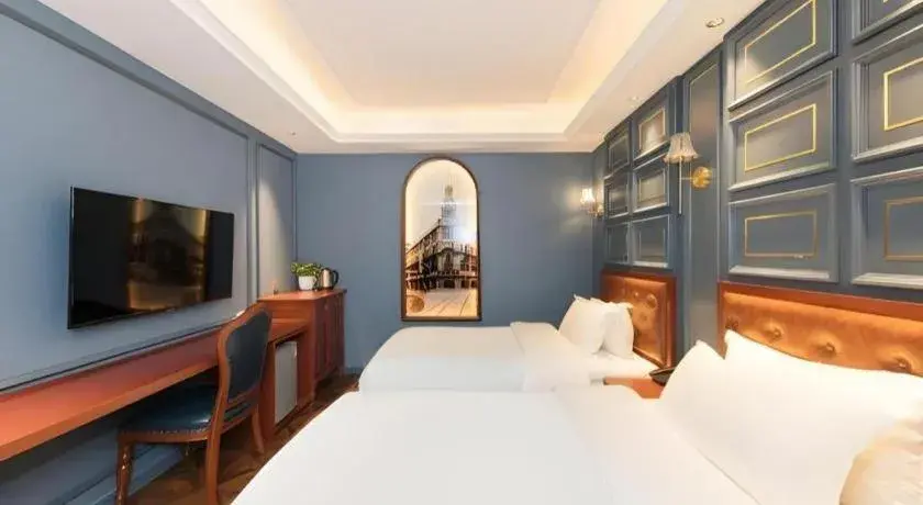 Bed in Yitingzhenshe Hotel Beijing Qianmen Bed in Yitingzhenshe Hotel Beijing Qianmen