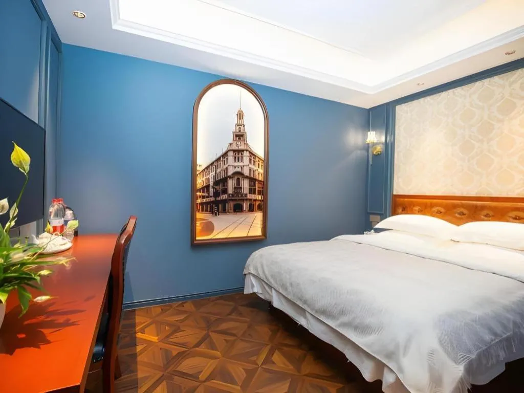 Bed in Yitingzhenshe Hotel Beijing Qianmen