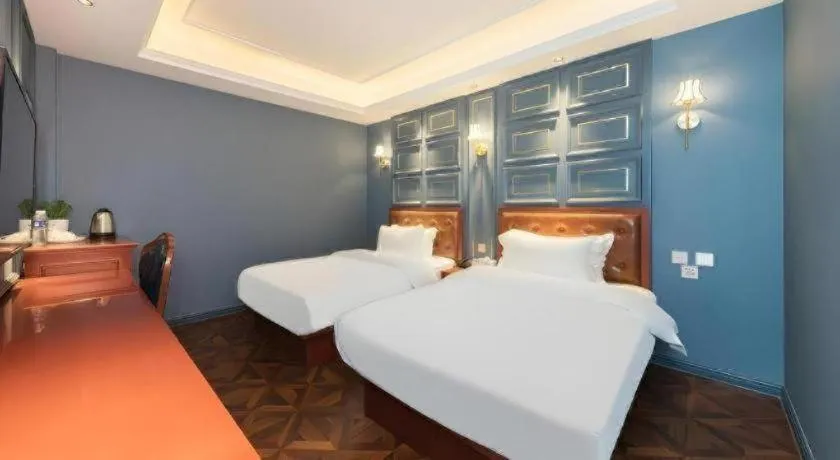 Bed in Yitingzhenshe Hotel Beijing Qianmen