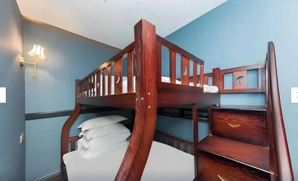 Bed in Yitingzhenshe Hotel Beijing Qianmen