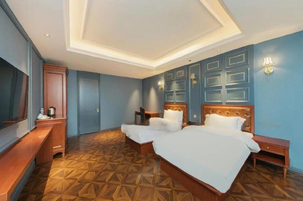 Bed in Yitingzhenshe Hotel Beijing Qianmen