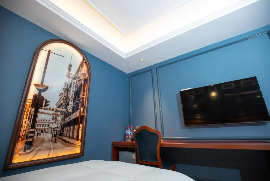 Bed in Yitingzhenshe Hotel Beijing Qianmen