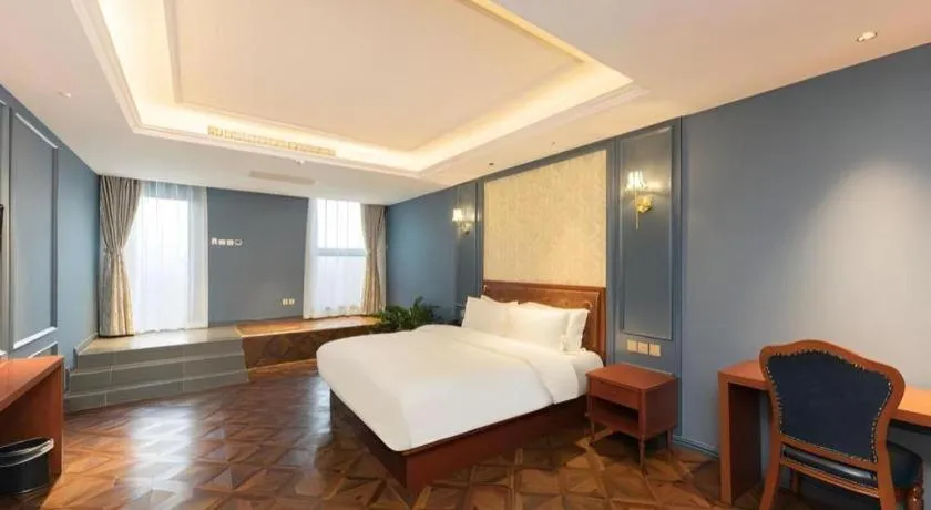 Bed in Yitingzhenshe Hotel Beijing Qianmen