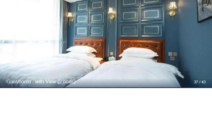 Bed in Yitingzhenshe Hotel Beijing Qianmen Bed in Yitingzhenshe Hotel Beijing Qianmen