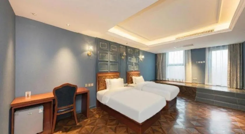 Bed in Yitingzhenshe Hotel Beijing Qianmen