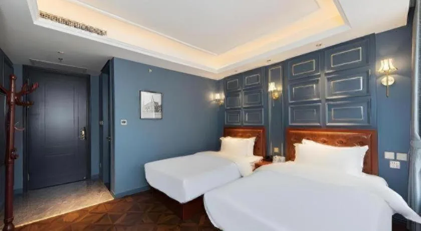 Bed in Yitingzhenshe Hotel Beijing Qianmen