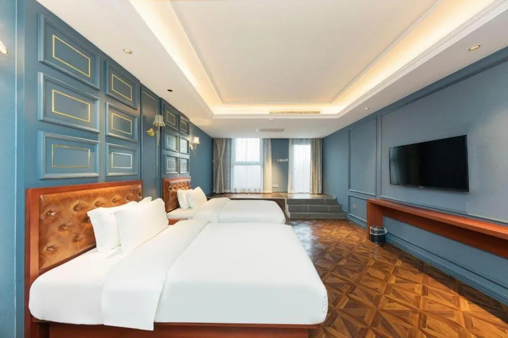 Bed in Yitingzhenshe Hotel Beijing Qianmen