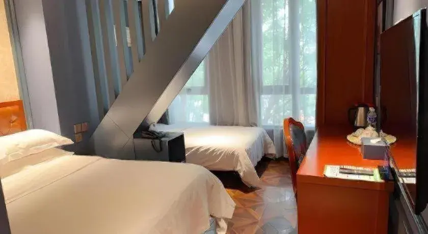 Bed in Yitingzhenshe Hotel Beijing Qianmen Bed in Yitingzhenshe Hotel Beijing Qianmen