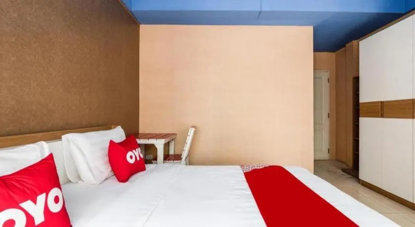 Bed in OYO 826 Cozy Rooms