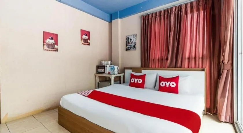 Bed in OYO 826 Cozy Rooms