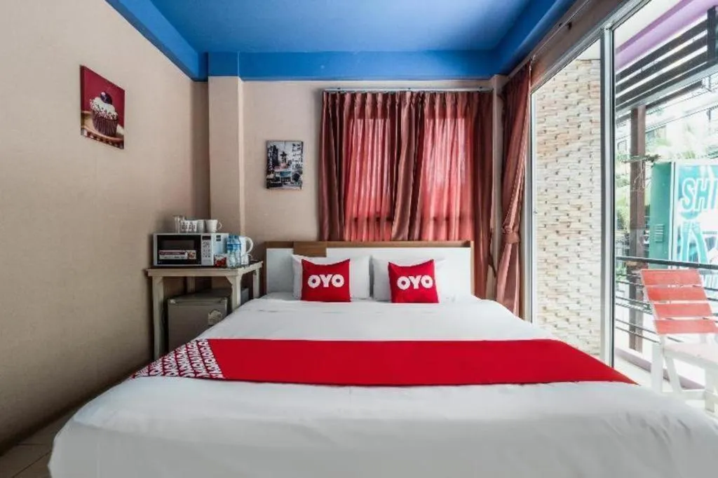 Bed in OYO 826 Cozy Rooms