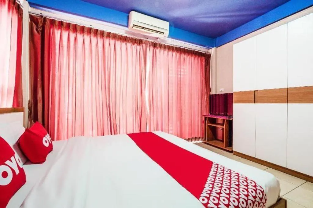 Bed in OYO 826 Cozy Rooms