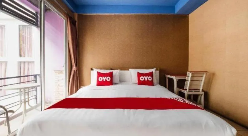 Bed in OYO 826 Cozy Rooms