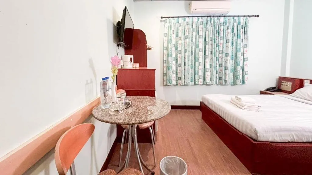 Bed in Sri Betong Hotel