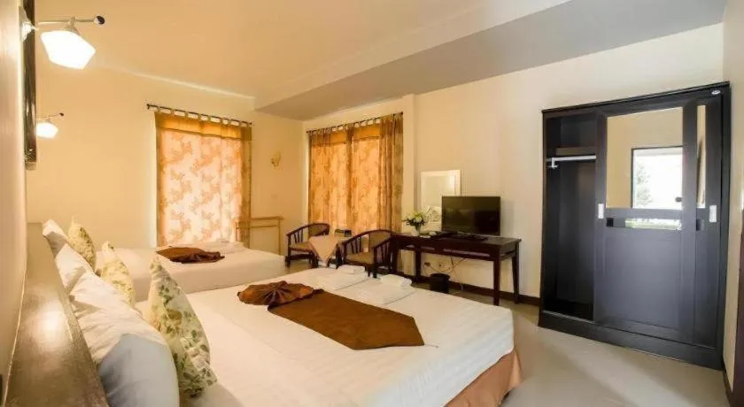 Bed in Kiang Talay Resort