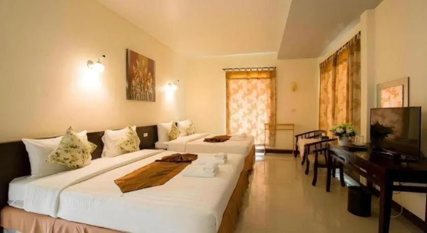 Bed in Kiang Talay Resort