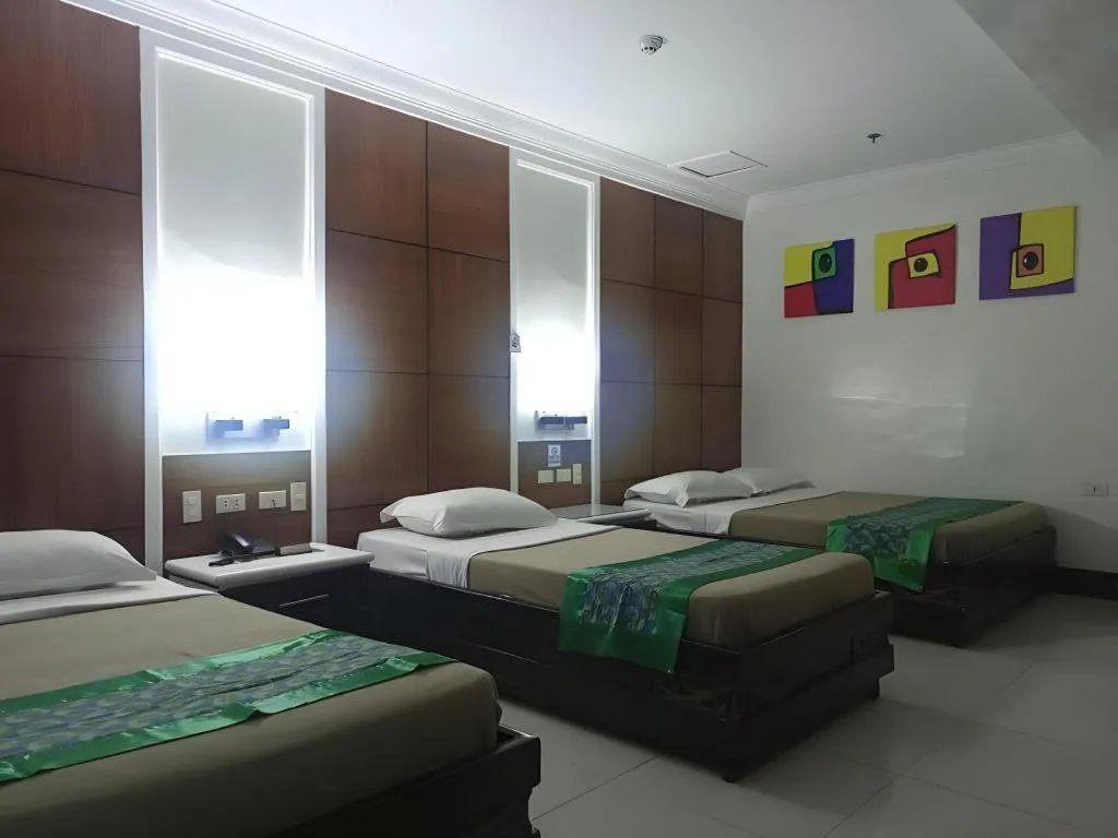 Bed in Marcian Business Hotel