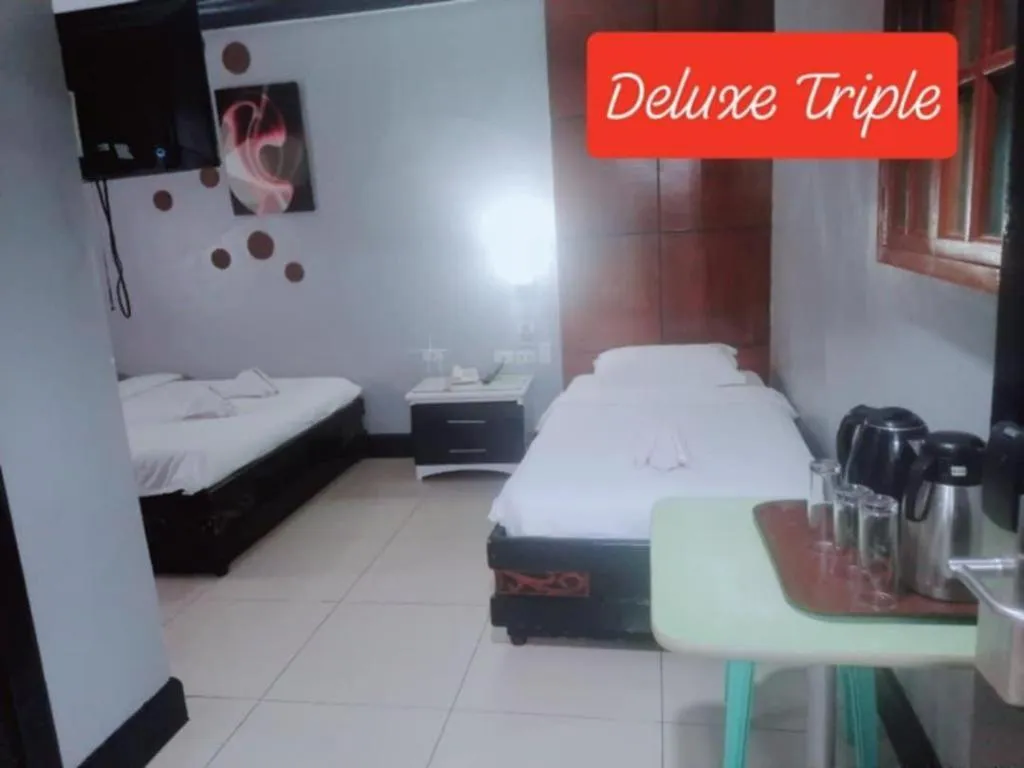 Bed in Marcian Business Hotel