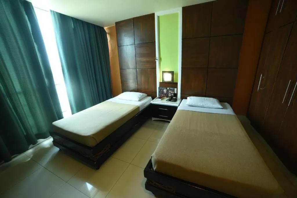 Bed in Marcian Business Hotel