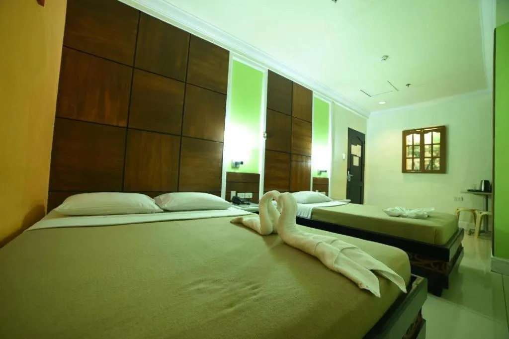 Bed in Marcian Business Hotel
