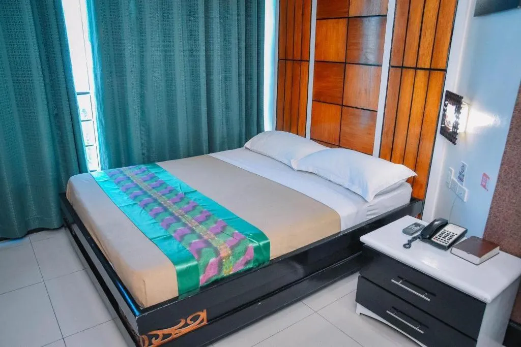 Bed in Marcian Business Hotel