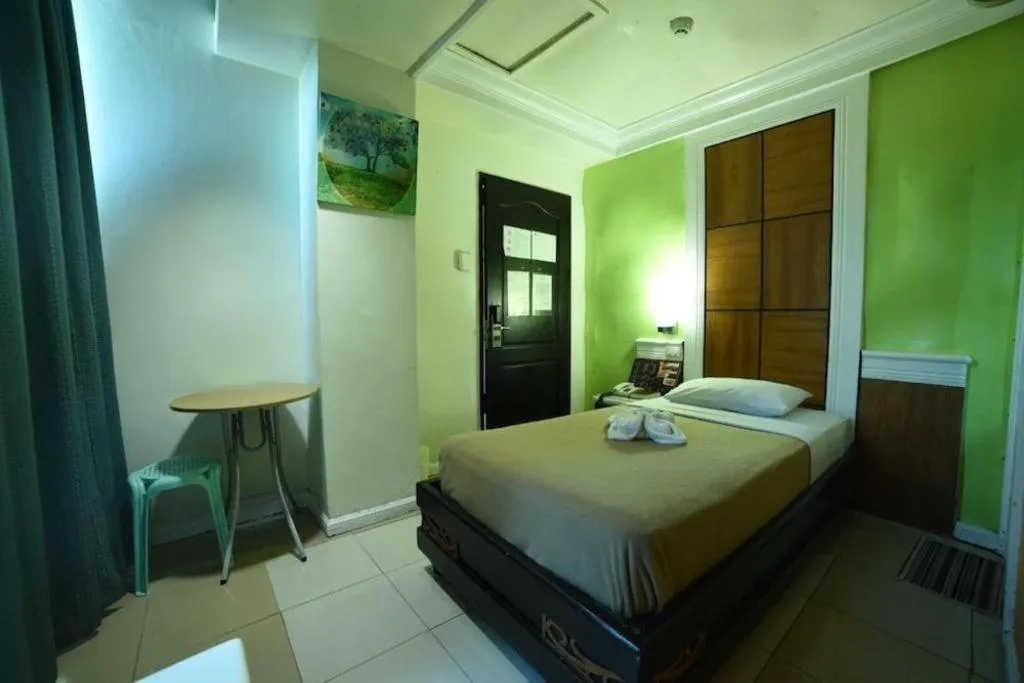 Bed in Marcian Business Hotel