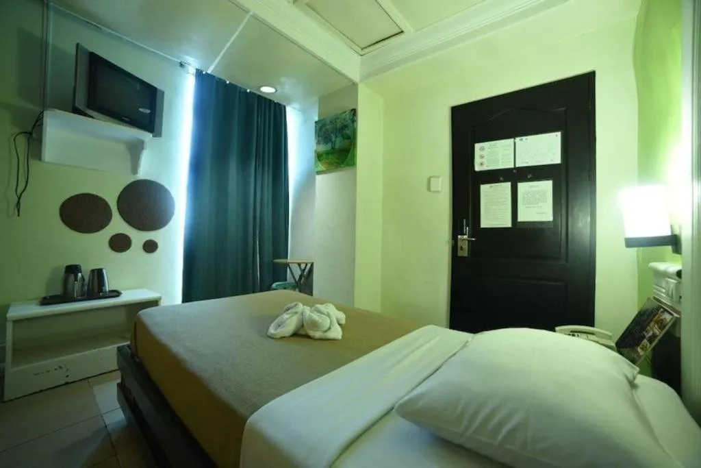 Bed in Marcian Business Hotel