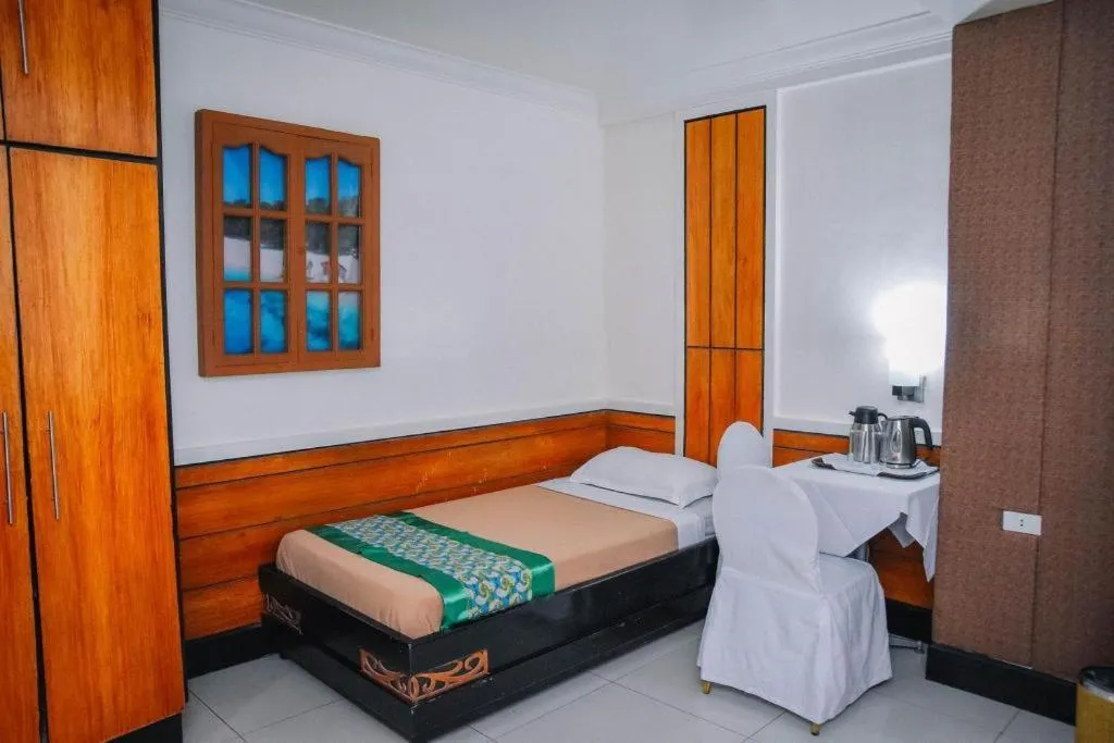 Bed in Marcian Business Hotel