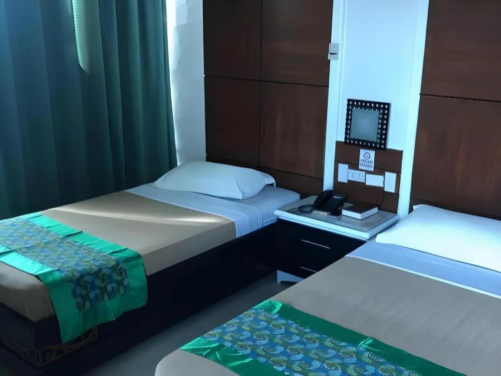 Bed in Marcian Business Hotel