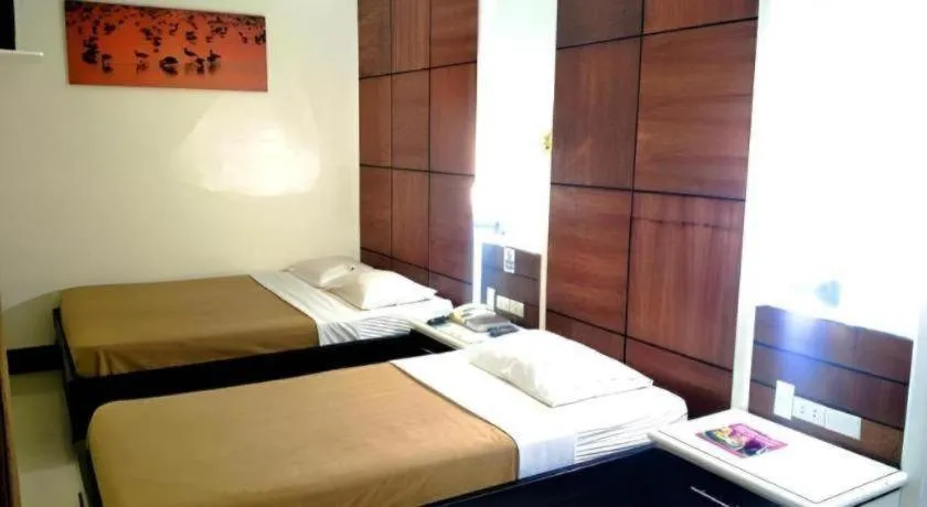 Bed in Marcian Business Hotel