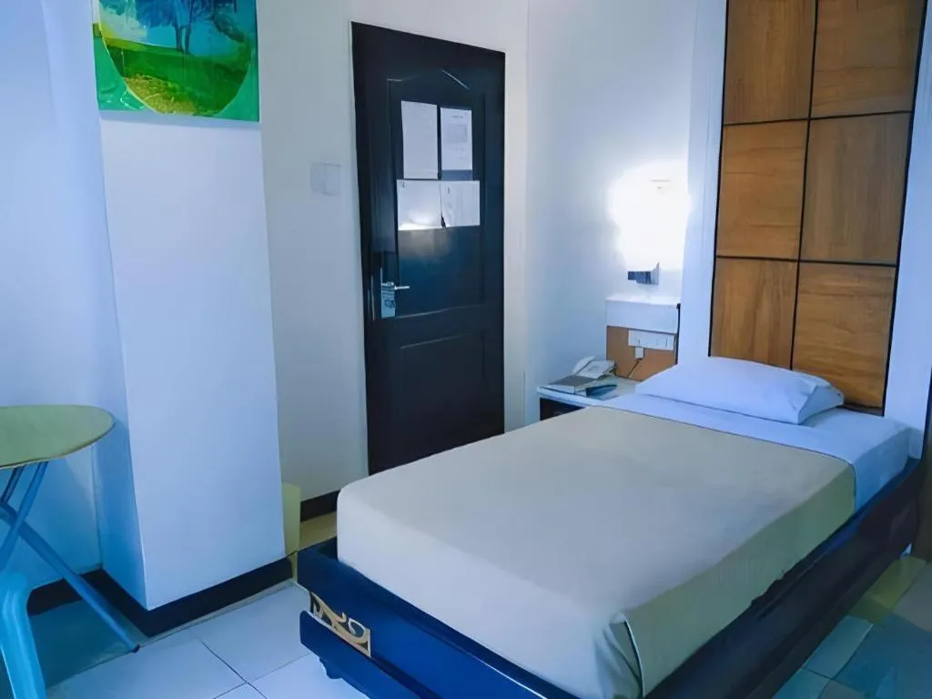 Bed in Marcian Business Hotel