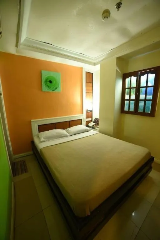 Bed in Marcian Business Hotel