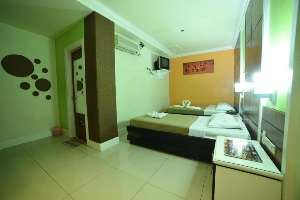 Bed in Marcian Business Hotel