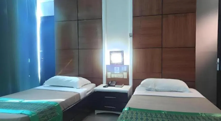 Bed in Marcian Business Hotel