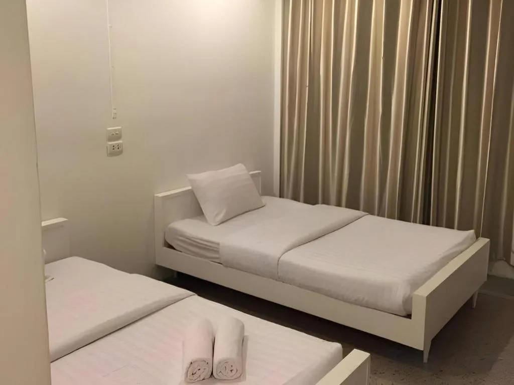 Bed in Chiang Rai Hotel