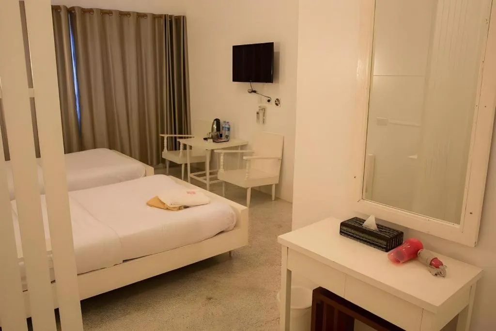 Bed in Chiang Rai Hotel