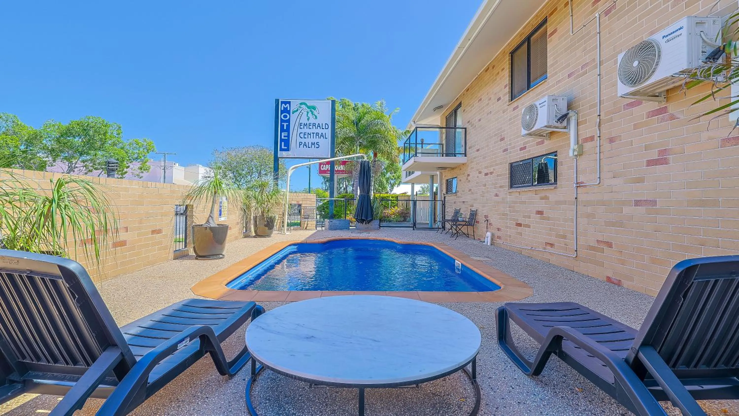 Pool view in Emerald Central Palms Motel