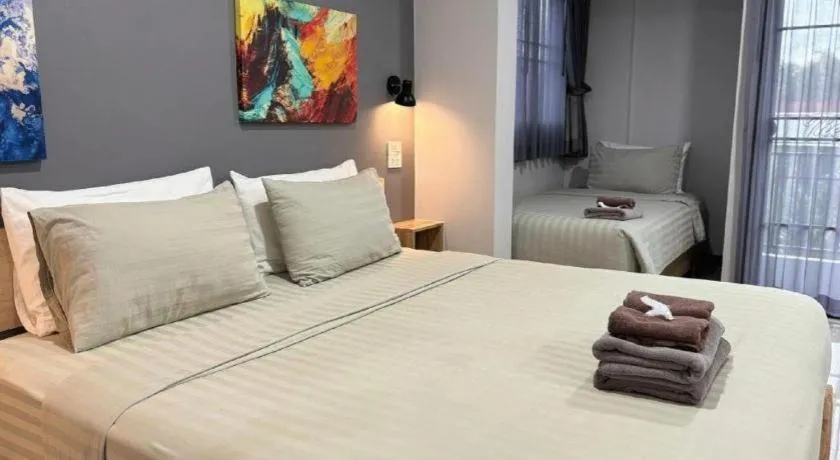 Bed in The Hub Hotel Surin