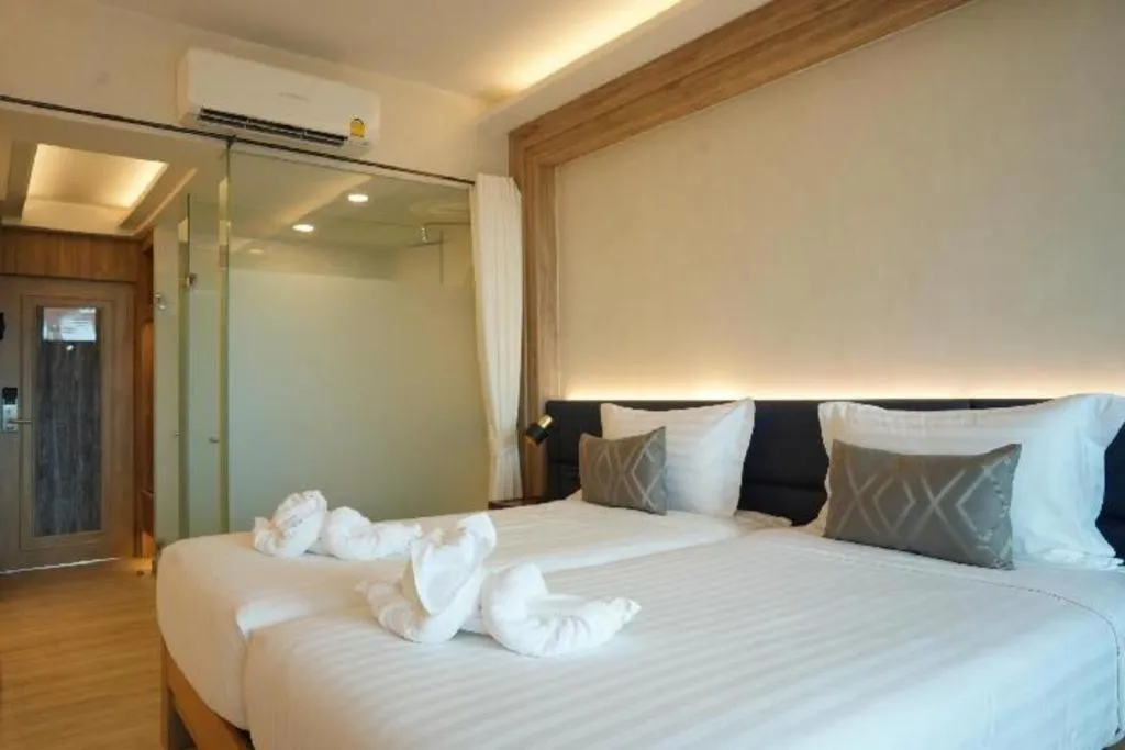 Bed in Phattrasom Villa